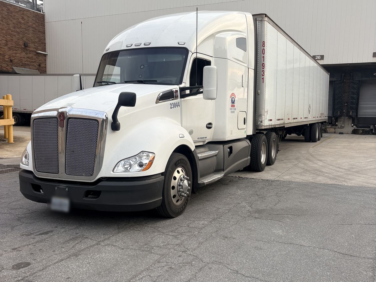Truck 23044 backed into a loading dock