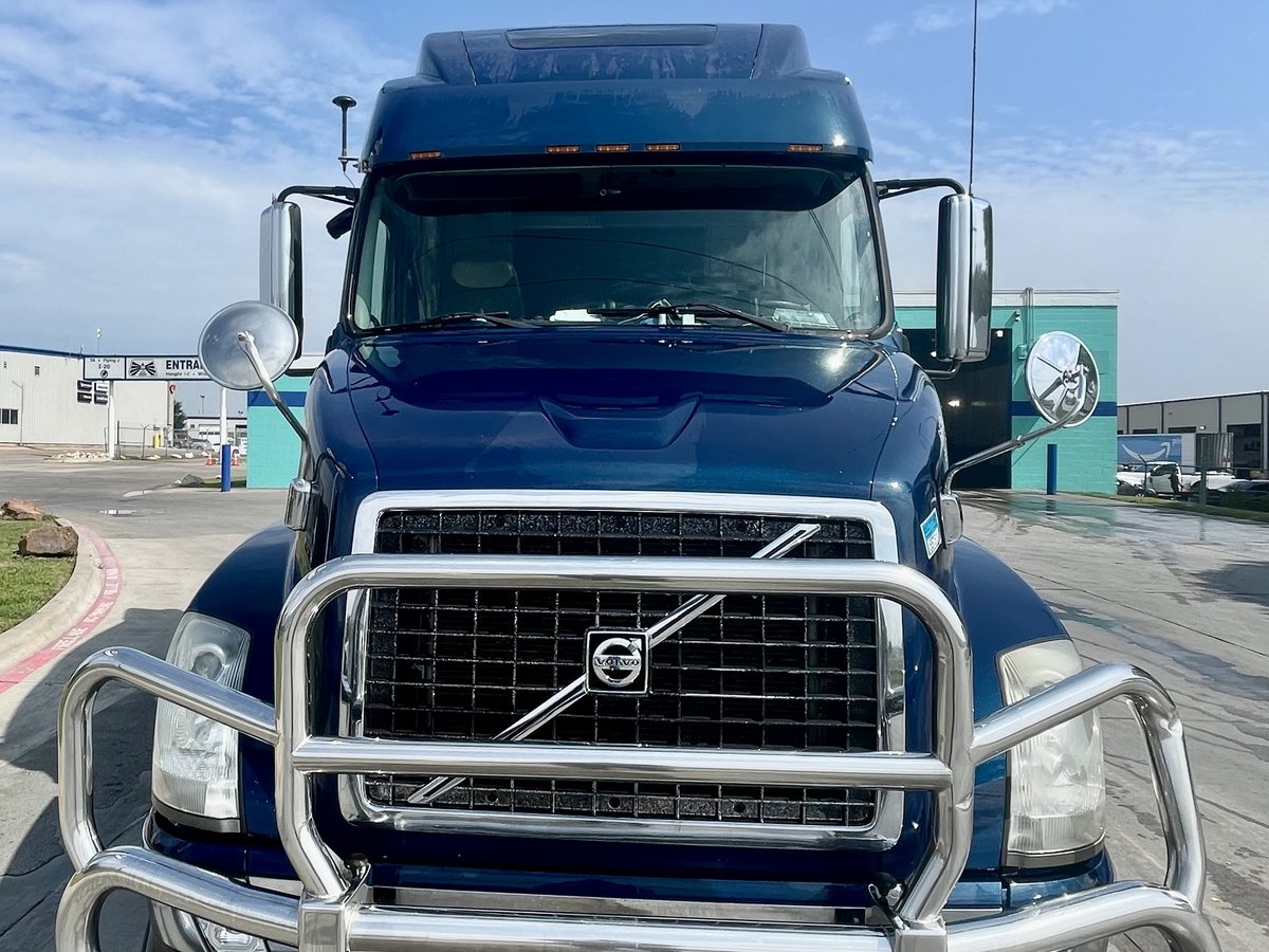 Front view of a blue Volvo truck
